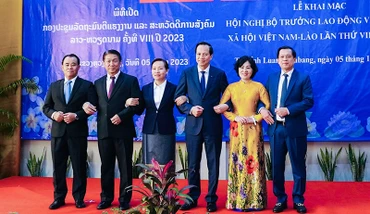 Các đại biểu tại lễ khai mạc Hội nghị Bộ trưởng Lao động và Phúc lợi xã hội Lào-Việt Nam lần thứ tám. (Ảnh: Dân trí)