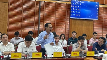 Đại biểu góp ý kiến tại hội thảo.