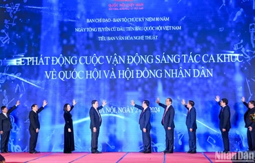 Chủ tịch Quốc hội Vương Đình Huệ cùng các đại biểu thực hiện nghi thức phát động cuộc vận động sáng tác ca khúc về Quốc hội và Hội đồng nhân dân.