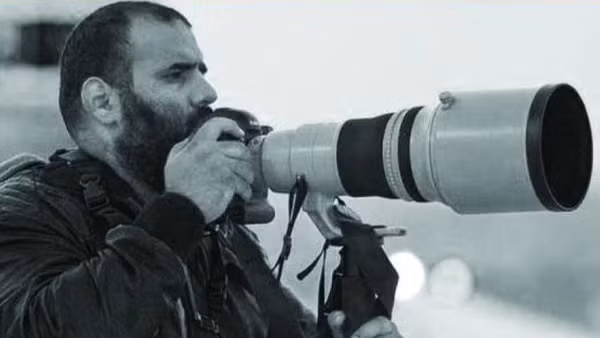 Phóng viên ảnh Khalid Al-Misslam. (Ảnh: Gulf Times)