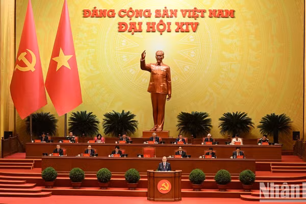 Tổng Bí thư Tô Lâm Báo cáo về các văn kiện trình Đại hội XIV Đảng Cộng sản Việt Nam tại phiên khai mạc Đại hội đại biểu toàn quốc lần thứ XIV Đảng Cộng sản Việt Nam. (Ảnh: TRẦN HẢI)