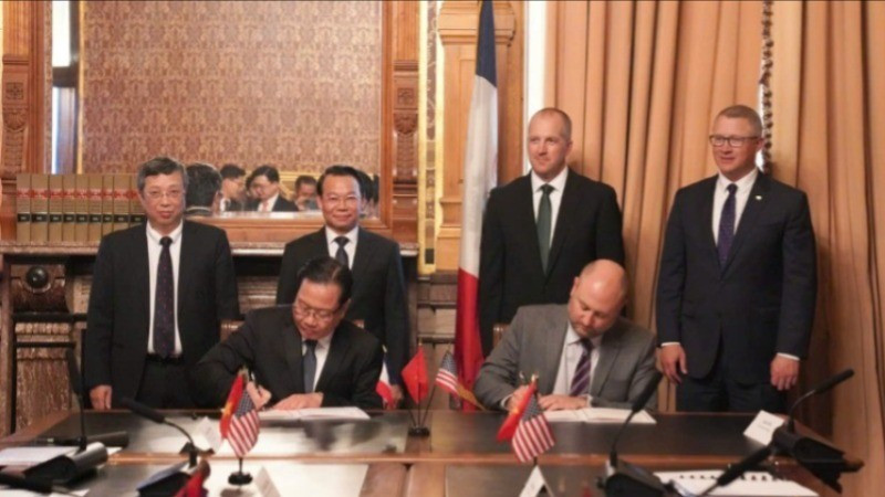 Lãnh đạo Bộ Nông nghiệp và Môi trường Việt Nam và Bộ Nông nghiệp bang Iowa chứng kiến lễ ký kết Bản ghi nhớ hợp tác thương mại nông lâm thủy sản. z6666083936577-9046f2e9cc8c9e0364bb2748e1a13f5e-247-8369.jpg