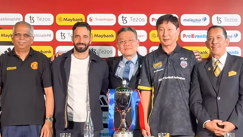 Huấn luyện viên Kim Sang Sik và Ruben Amorim tại buổi họp báo. (Ảnh: VFF)