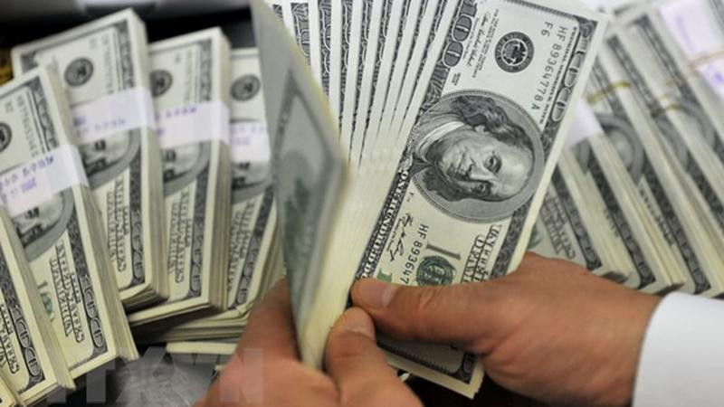 Đồng USD. (Ảnh: AFP/TTXVN)