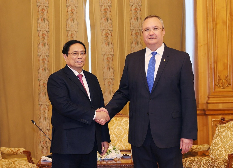 Thủ tướng Phạm Minh Chính hội kiến Chủ tịch Thượng viện Romania Nicolae Ionel Ciuca. (Ảnh: Dương Giang/TTXVN)