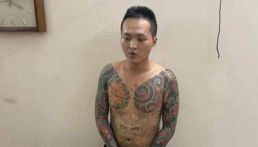 Đối tượng Trần Văn Cao tại cơ quan công an.