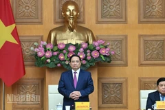 Thủ tướng Chính phủ Phạm Minh Chính chủ trì cuộc làm việc với các doanh nghiệp bán dẫn thuộc Hiệp hội Bán dẫn toàn cầu (SEMI). (Ảnh: TRẦN HẢI)