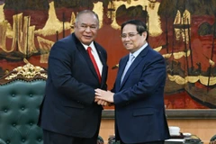 Thủ tướng Chính phủ Phạm Minh Chính và Bộ trưởng Ngoại giao và Hợp tác Timor-Leste Bendito dos Santos Freitas. (Ảnh: TRẦN HẢI)