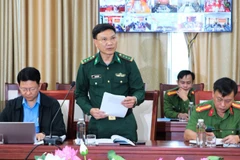 Đại diện Ban Chỉ huy Bộ đội Biên phòng tỉnh Nghệ An phát biểu tham luận tại hội nghị. 