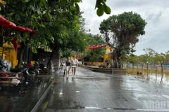 Phố cổ Hội An trong mùa mưa ngập. (Ảnh: ANH ĐÀO - CƯỜNG ART)