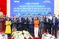 Các đại biểu tham dự hội thảo tại Báo Nhân Dân. Ảnh: TRẦN SƠN HẢI