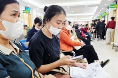 Quét mã QR để xem kết quả khám, chữa bệnh tại Bệnh viện T.Ư Quân đội 108. Ảnh: NAM NGUYỄN