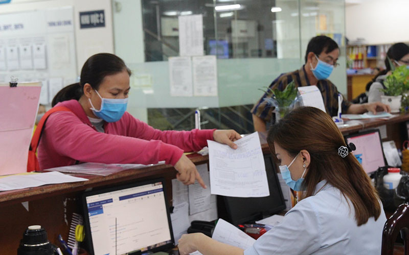 Kịp thời tiếp nhận, giải quyết hồ sơ hỗ trợ người lao động và người sử dụng lao động tại TP Hồ Chí Minh. (Ảnh: Trung Tâm) 