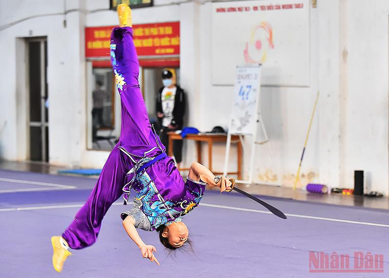 Ngoài ra còn có vận động viên Hoàng Thị Phương Giang nội dung trường quyền (đao và côn). Wushu - mỏ vàng của Thể thao Việt Nam -0