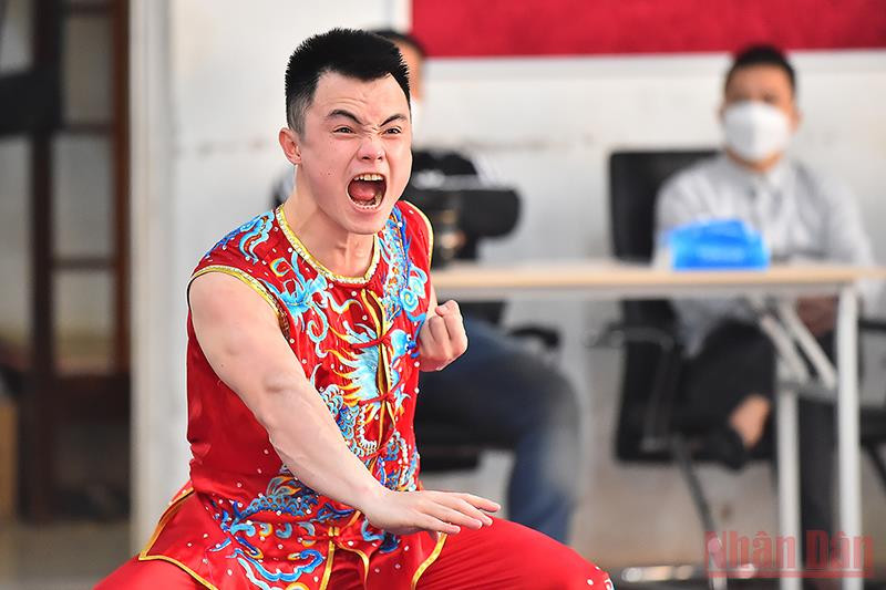 Vận động viên Nông Văn Hữu nội dung nam quyền, nam đao và nam côn. Wushu - mỏ vàng của Thể thao Việt Nam -0