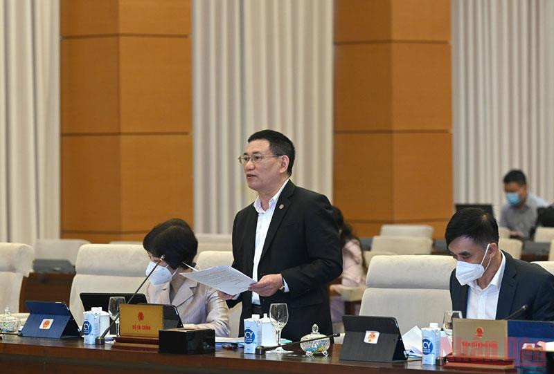 Bộ trưởng Tài chính Hồ Đức Phớc phát biểu báo cáo tại phiên họp. Chất vấn, trả lời chất vấn góp phần nâng cao năng lực quản lý nhà nước -0