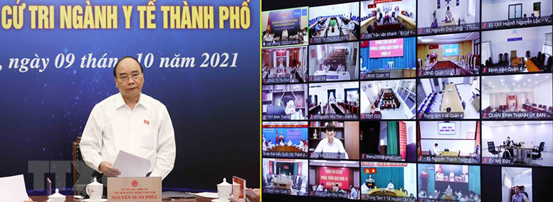 Chủ tịch nước Nguyễn Xuân Phúc và Đoàn Đại biểu Quốc hội TP Hồ Chí Minh tiếp xúc cử tri ngành y tế thành phố theo hình thức trực tuyến. (Ảnh: TTXVN) Kiểm soát chặt chẽ, không được chủ quan, thích ứng an toàn với Covid-19 -0