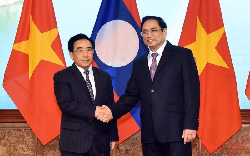 Thủ tướng Phạm Minh Chính và Thủ tướng Lào Phankham Viphavanh. (Ảnh: Trần Hải)