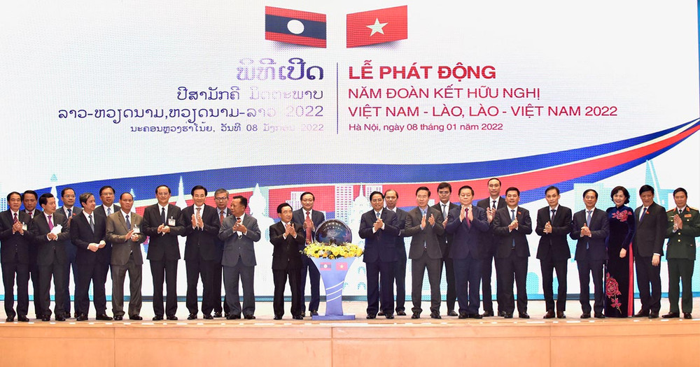 Thủ tướng Phạm Minh Chính và Thủ tướng Lào Phankham Viphavanh cùng đại biểu hai nước tại Lễ phát động Năm Đoàn kết Hữu nghị Việt Nam-Lào, Lào-Việt Nam 2022. (Ảnh: Trần Hải) dsc_6261.jpg -0