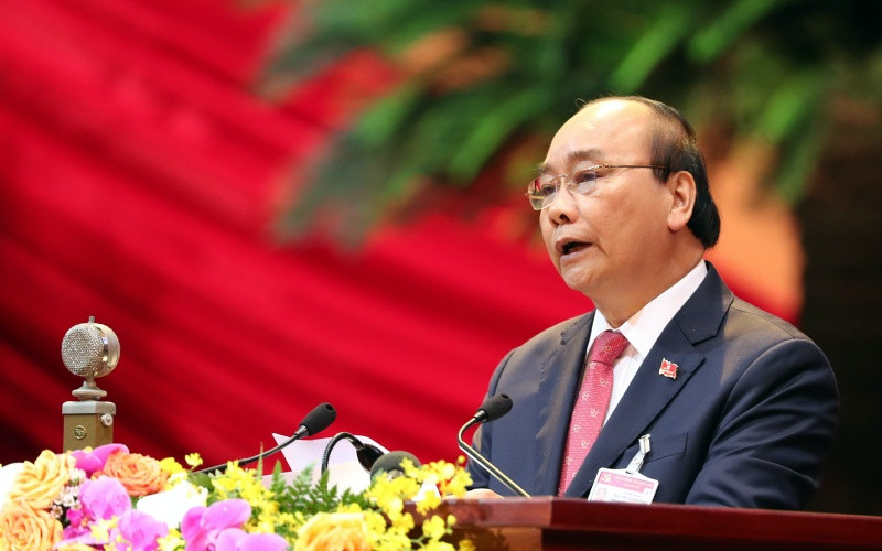 Thay mặt Đoàn Chủ tịch, đồng chí Nguyễn Xuân Phúc, Ủy viên Bộ Chính trị khóa XII, Thủ tướng Chính phủ đọc diễn văn khai mạc. 5_3092-1611644047765.jpg