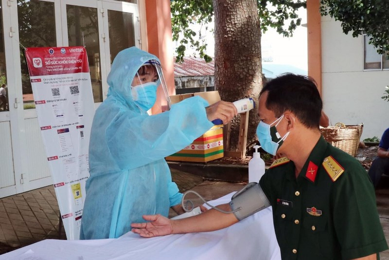 Tổ chức tiêm ngừa tại buổi lễ. Bình Dương tiêm chủng vaccine và phun khử khuẩn diện rộng -0