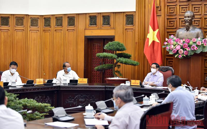 (Ảnh: TRẦN HẢI) Thủ tướng Phạm Minh Chính làm việc với Bộ Tư pháp -0