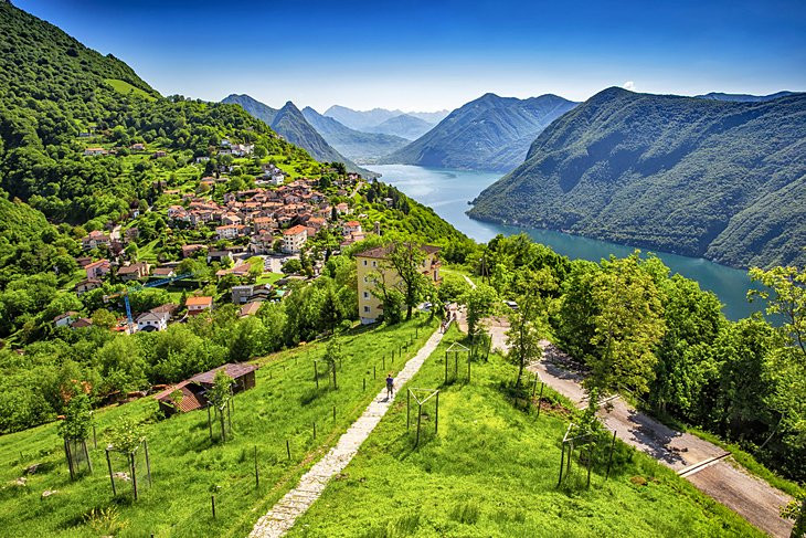 Hồ Lugano, bang Ticino là điểm hấp dẫn du khách (Ảnh: Planetware) Thụy Sĩ hoàn thành dự án đường sắt qua dãy Alps, rút ngắn kết nối châu Âu -0