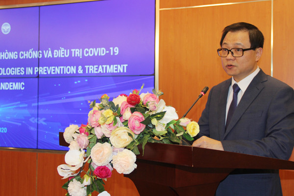Vụ trưởng Vụ hợp tác quốc tế Bộ TT-TT Triệu Minh Long phát biểu khai mạc Hội thảo . Làm chủ công nghệ giúp Việt Nam kiểm soát thành công đại dịch -0