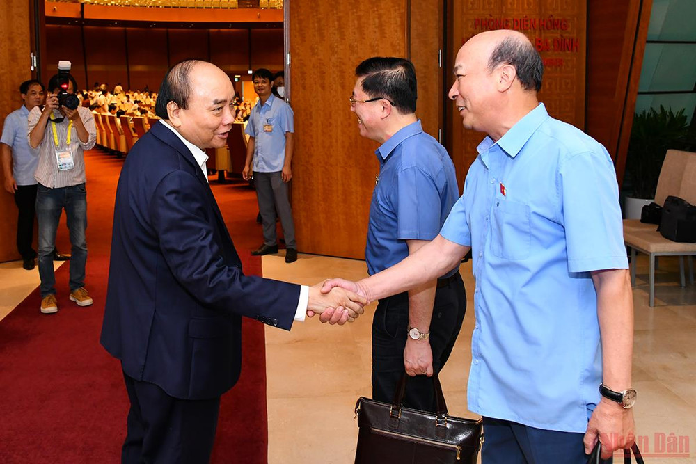 Chủ tịch nước Nguyễn Xuân Phúc và các vị đại biểu Quốc hội tại buổi làm việc ngày 9/6. Tinh thần trách nhiệm cao trước Quốc hội, cử tri và nhân dân -0