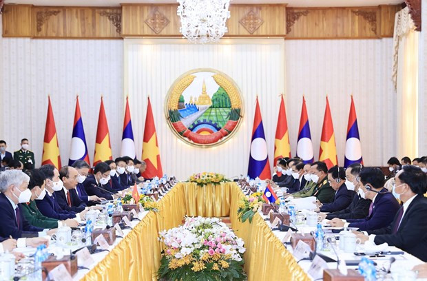 Chủ tịch nước Nguyễn Xuân Phúc hội kiến Thủ tướng Lào Phankham Viphavanh. (Ảnh: Thống Nhất/TTXVN) Chủ tịch nước Nguyễn Xuân Phúc hội kiến Thủ tướng Chính phủ Lào -0