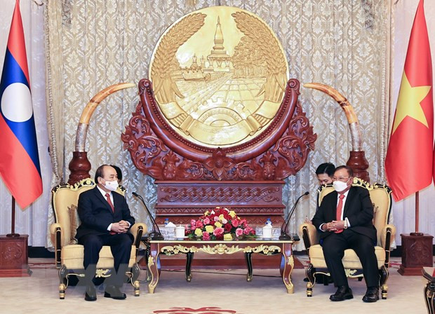 Chủ tịch nước Nguyễn Xuân Phúc gặp Nguyên Tổng Bí thư, Chủ tịch nước Lào Bounnhang Vorachith. (Ảnh: Thống Nhất/TTXVN) Chủ tịch nước Nguyễn Xuân Phúc hội kiến Thủ tướng Chính phủ Lào -0