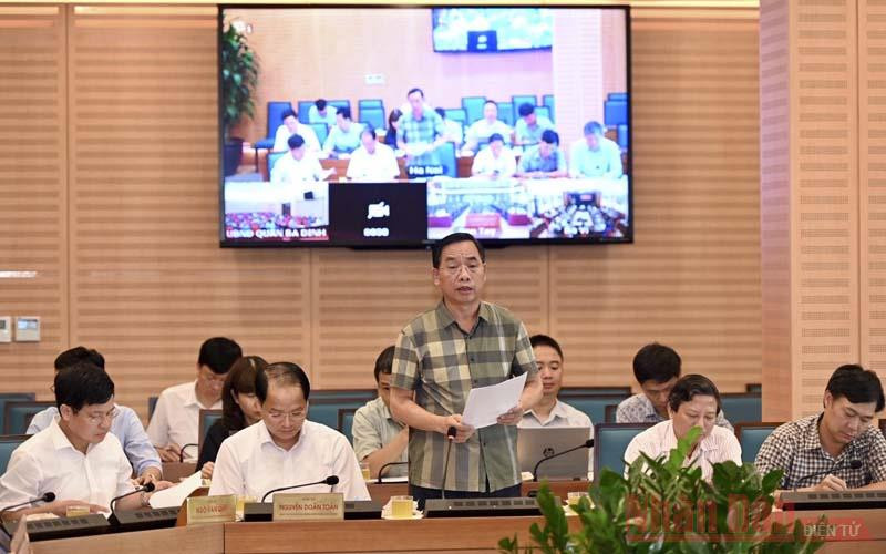 Giám đốc Sở Y tế Nguyễn Khắc Hiền phát biểu báo cáo tại cuộc họp. (Ảnh: DUY LINH) Hà Nội sẽ xét nghiệm PCR diện rộng cho người về từ Đà Nẵng -0