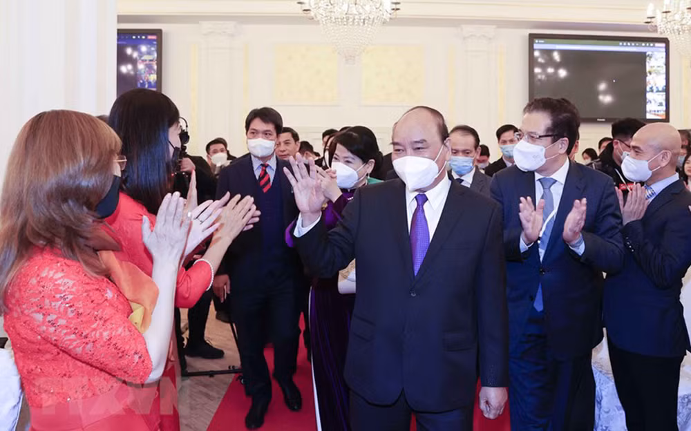 Hình ảnh Chủ tịch nước Nguyễn Xuân Phúc gặp gỡ đại diện cộng đồng Việt Nam tại Nga -0