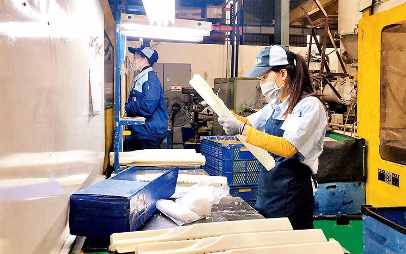 Lao động tại Công ty cổ phần Nhựa Hiệp Hòa - Việt Nam, huyện Đông Anh, Hà Nội (Ảnh minh họa).