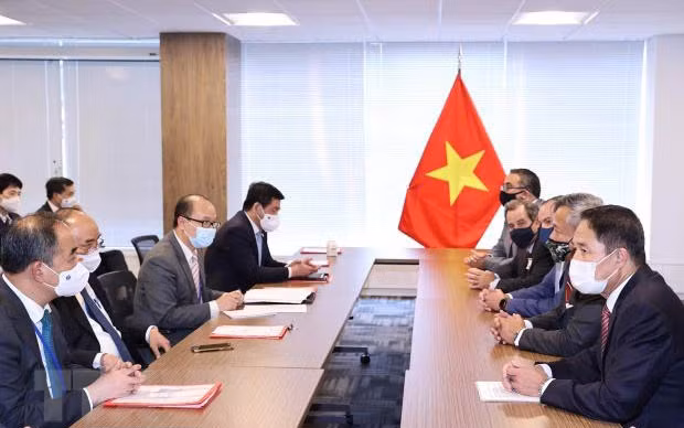 Chủ tịch nước Nguyễn Xuân Phúc tiếp Tập đoàn Macquaire, JP Morgan, Bechtel, GE, McDermontt. (Ảnh: Thống Nhất/TTXVN)