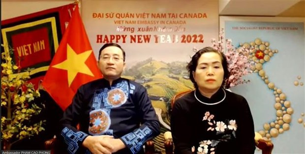 Đại sứ Việt Nam tại Canada và phu nhân tham dự chương trình đón Tết cổ truyền Nhâm Dần với cộng đồng người Việt. (Ảnh: TTXVN) Thủ tướng Trudeau chúc Tết cộng đồng người Việt tại Canada -0