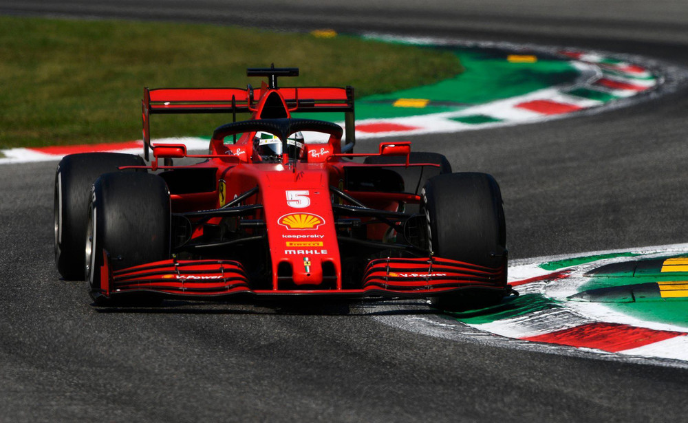 Vettel (đội Ferrari) phải dừng bước sớm trên sân nhà khi gặp trục trặc kỹ thuật. Kịch tính ở trường đua Monza -0