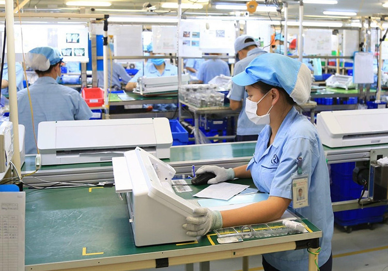 Sản xuất tại Công ty TNHH Rhythm Precision Việt Nam, Khu công nghiệp Nội Bài (huyện Sóc Sơn, Hà Nội). (Ảnh: ĐĂNG ANH) Bài 4: Nỗ lực vượt khó -0