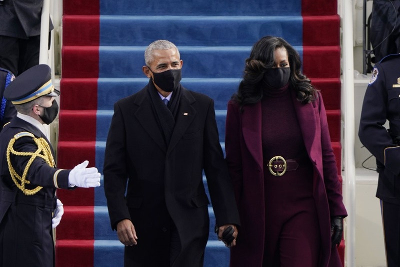 Tổng thống thứ 44 của nước Mỹ Barack Obama và phu nhân Michelle tham dự buổi lễ. (Ảnh: AP) Ảnh -0