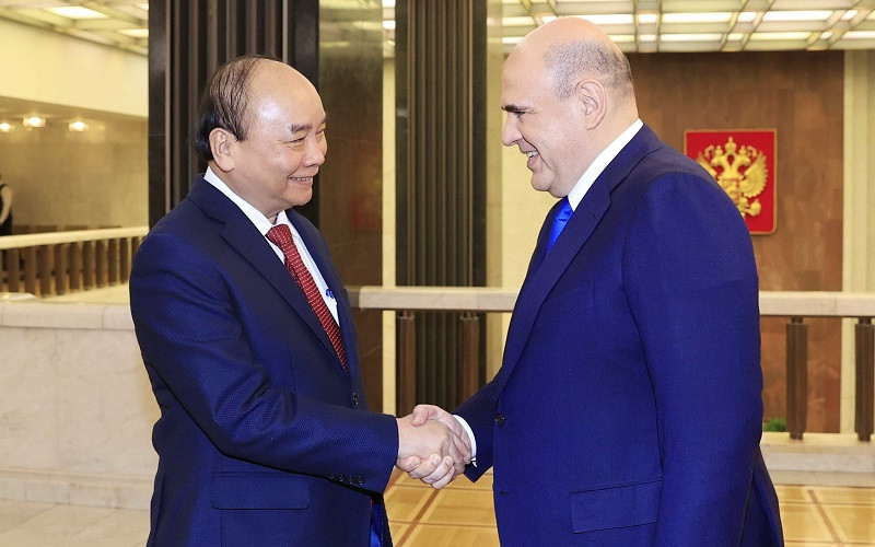 Chủ tịch nước Nguyễn Xuân Phúc hội kiến Thủ tướng Liên bang Nga Mikhail Vladimirovich Mishustin. (Ảnh: TTXVN)