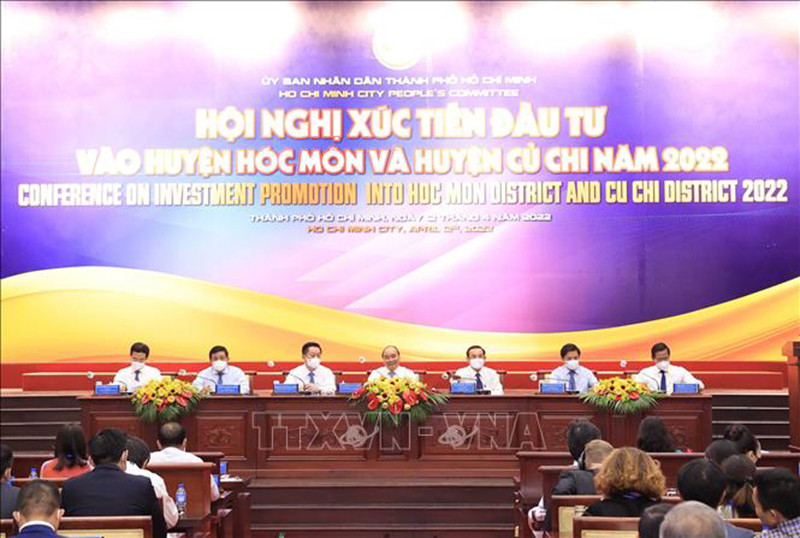 Chủ tịch nước Nguyễn Xuân Phúc dự Hội nghị xúc tiến đầu tư vào hai huyện Hóc Môn và Củ Chi năm 2022. (Ảnh: TTXVN) Xây dựng 2 huyện Củ Chi và Hóc Môn thành động lực phát triển mới cho Thành phố Hồ Chí Minh và khu vực -0