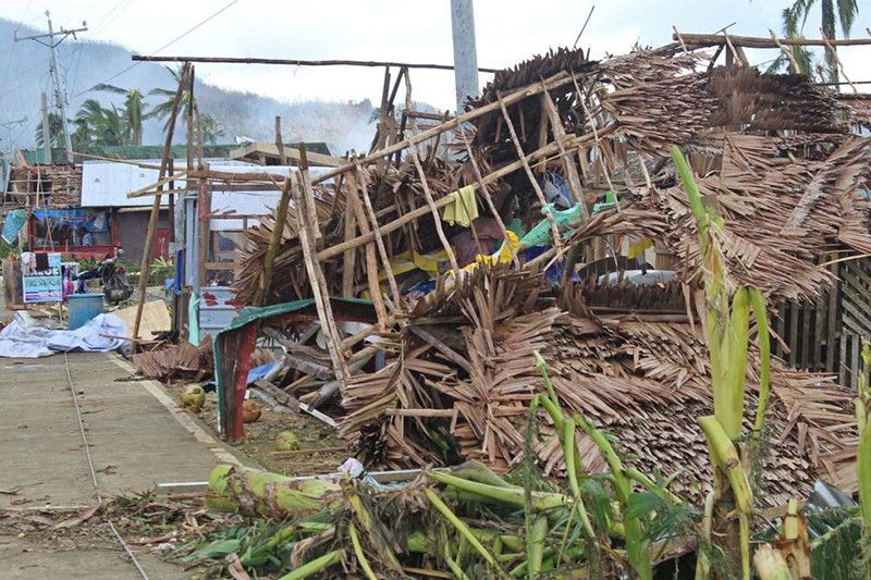 Bão Rai tàn phá nhiều nhà ở tại tỉnh Surigao del Norte. (Ảnh: Lực lượng Bảo vệ bờ biển Philippines/Reuters) Ít nhất 375 người chết do bão Rai, Philippines khẩn trương tìm người mất tích -0