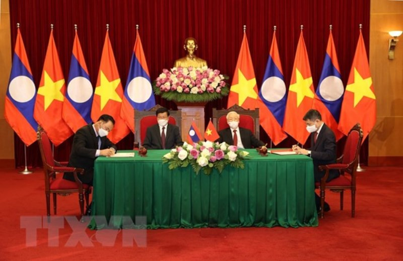 Lễ ký Thỏa thuận hợp tác giữa hai Văn phòng Trung ương của hai Đảng giai đoạn 2021-2025. (Ảnh: TTXVN) Tổng Bí thư Nguyễn Phú Trọng và Tổng Bí thư, Chủ tịch nước Lào chứng kiến Lễ ký kết văn kiện hợp tác giữa Việt Nam-Lào -0