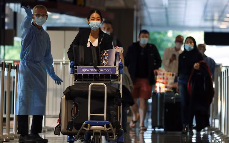 Khách quốc tế tới sân bay Changi, Singapore. (Nguồn: Reuters)