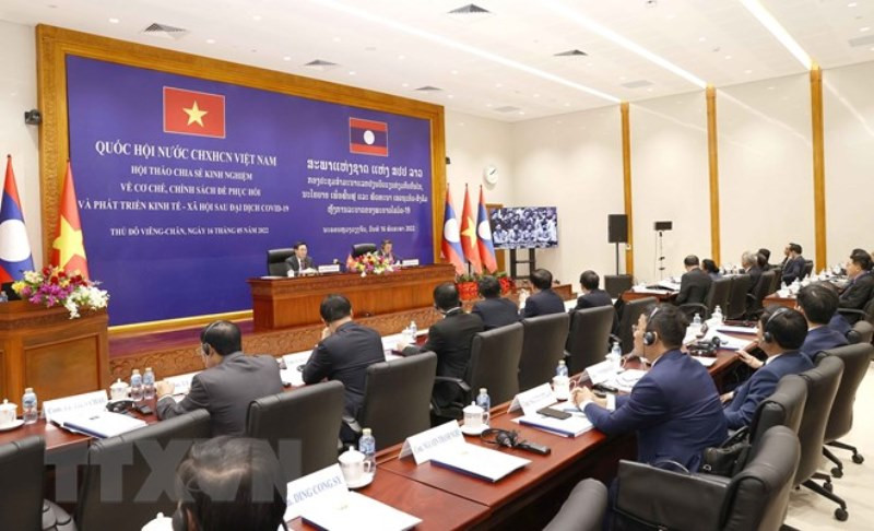 Quang cảnh hội thảo. (Ảnh: Doãn Tấn/TTXVN) Việt Nam-Lào chia sẻ kinh nghiệm phát triển kinh tế-xã hội sau đại dịch -0