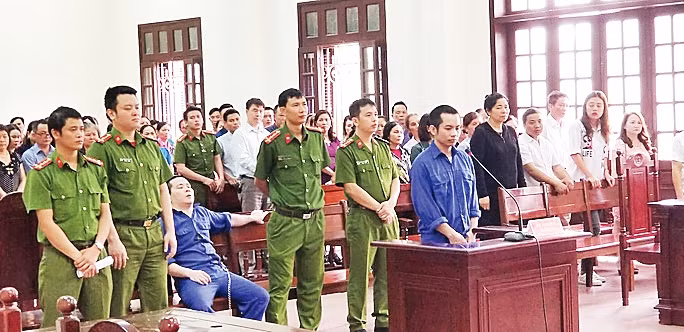 Phiên tòa xét xử bị cáo Nguyễn Xuân Thu, Tổng Giám đốc Công ty TNHH Vinaca và đồng phạm về hành vi sản xuất hàng giả từ bột than. ẢNH | TRỌNG ĐỨC
