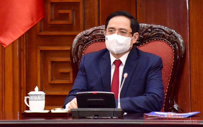 (ẢNH: TRẦN HẢI) Thủ tướng Phạm Minh Chính tiếp Chủ tịch COP26 -0