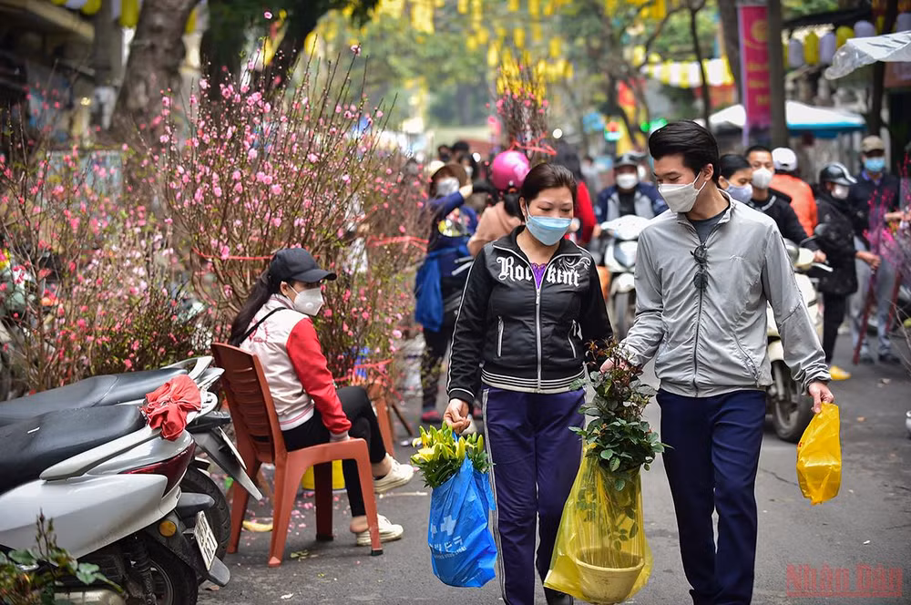Hà Nội “thay áo mới” rực rỡ đón Xuân Nhâm Dần 2022 -0