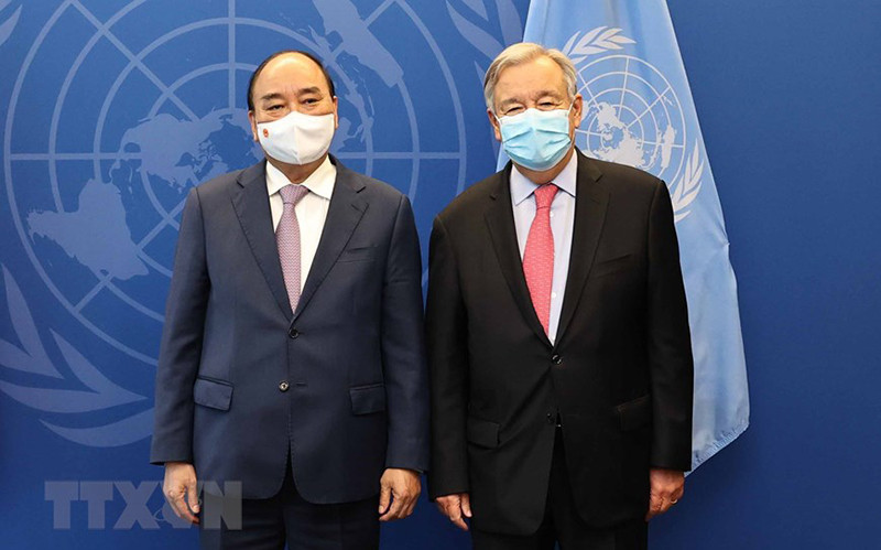 Chủ tịch nước Nguyễn Xuân Phúc gặp Tổng thư ký Liên hợp quốc Antonio Guterres. Ảnh: TTXVN Chủ tịch nước đề nghị Liên Hiệp Quốc hỗ trợ Việt Nam tiêm vaccine rộng rãi -0