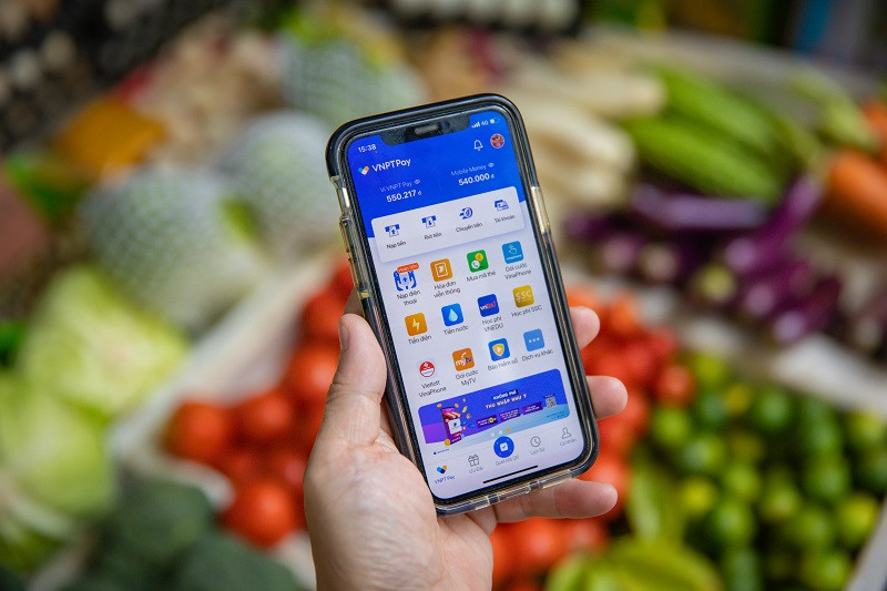 Ứng dụng Mobile Money do tập đoàn Bưu chính Viễn thông Việt Nam (VNPT) phát triển. (Ảnh: TTXVN). WB: Cải cách giúp Việt Nam thành nền kinh tế thu nhập cao vào năm 2045 -0